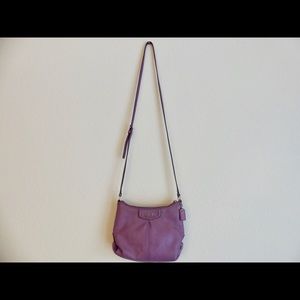 Lavender crossbody Coach purse